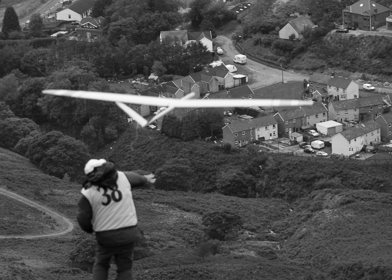 John Bennett took this one of me launching, but the camera was more interested in Nanty Moel below!
