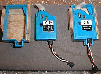 Wing servos mounted in boxes