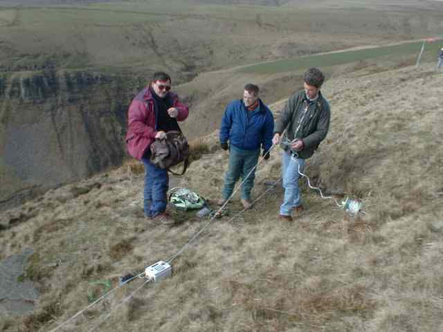 Dave Woods, John Phillips and Alex McMeekin unreel the buzzer cables