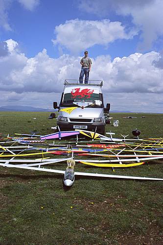 Ali Oldman atop the funbus, with just some of the 39 models laid out.