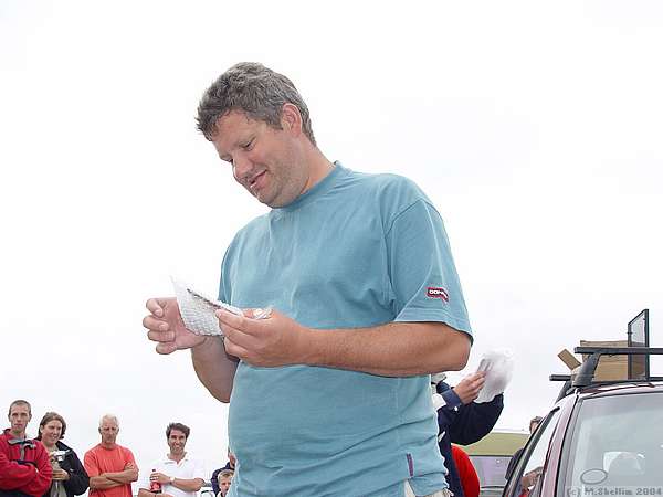 John McCurdy unwrapping his third place trophy. Rumour is that he has a new machine on order.