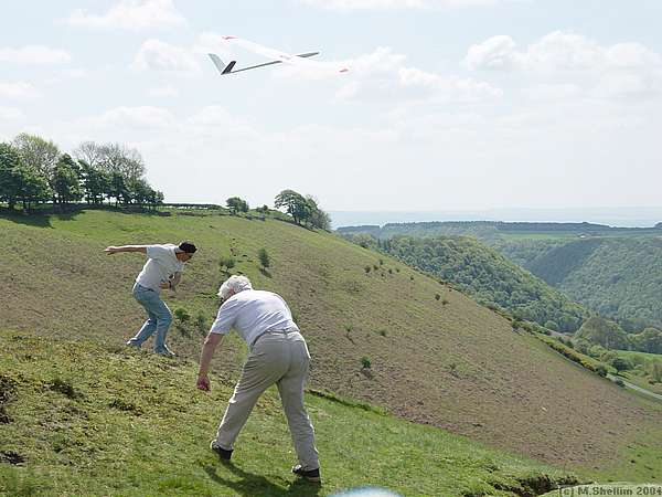 Frank and Tom do their zombie dance routine while a model sails overhead...