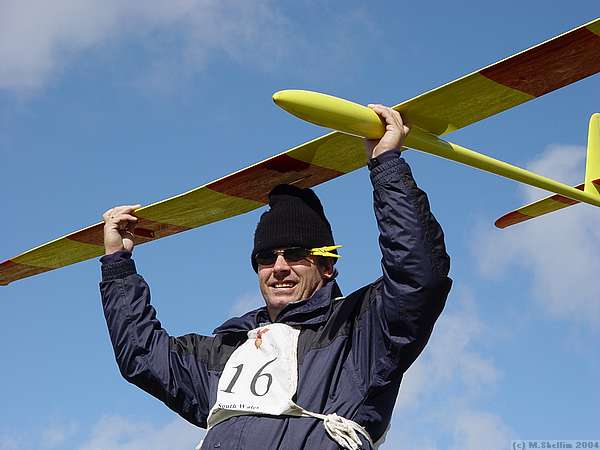 Frank Hulton holding Ian Mason's Acacia 3 X-tail.