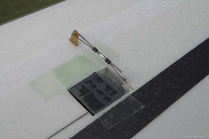 Wing servos were originally on a Piccolo E-Heli. They are not labelled, but I believe they are GWS Picos.