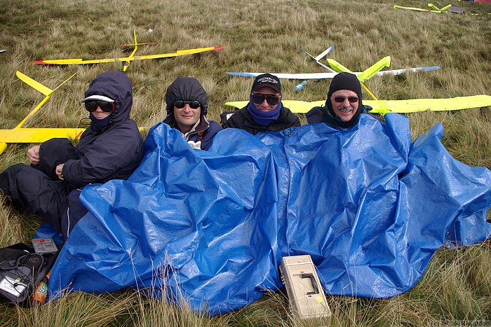 Togetherness! Keith Wood, Mick Lideard, Rich Bago and Jon Edison take shelter.