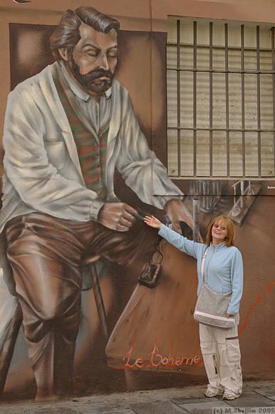 Kevin and his wife Jan and I all stayed in Guadalajara, an attractive town 30 mins from La Muela. Here's Jan making friends with a mural.