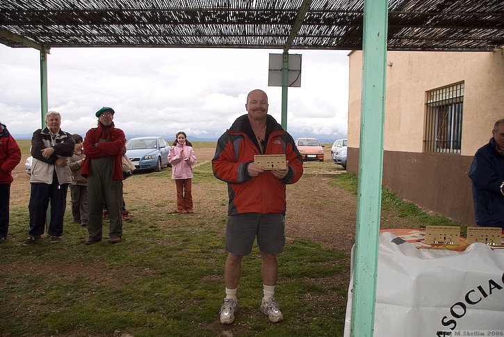 Tim collects trophy for fastest time