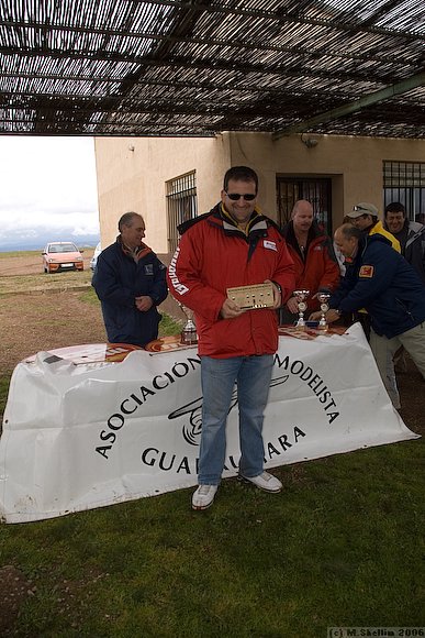 Enaki with winners trophy