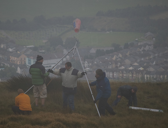 Setting up the course. The fog did clear, and the wind did blow.