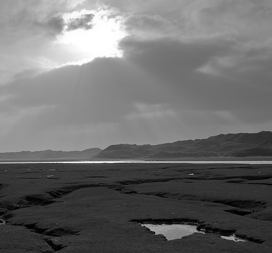 Looking North from the Ogmore estuary to the sand dunes of Merthyr Mawr