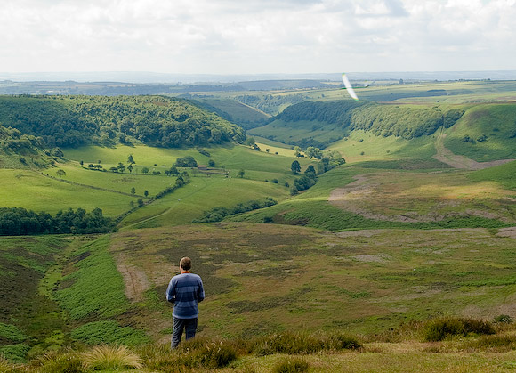 What more could a slope soarer ask for? Mike flying his Sting off the south bowl.