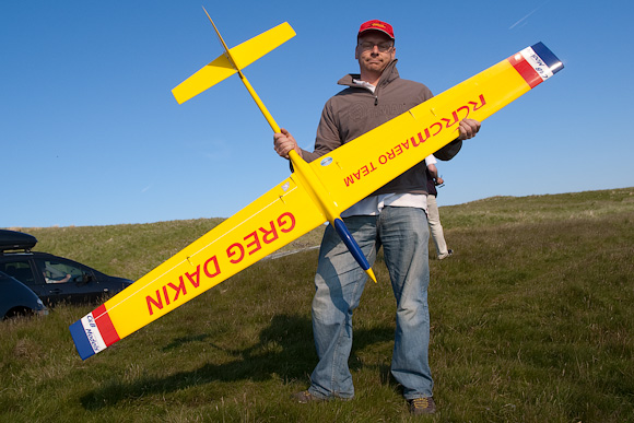 Ian Mason holds Greg's Vector III. Greg entertained with some fast and wide aerobatics off the Wrecker.