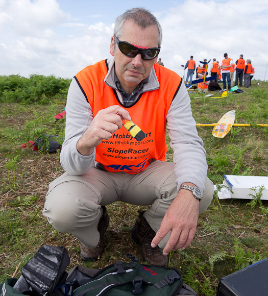 Mike Evans with his HD keyfob cam. Yellow tape is to bind a couple of giant cocktail sticks for attaching to foam.