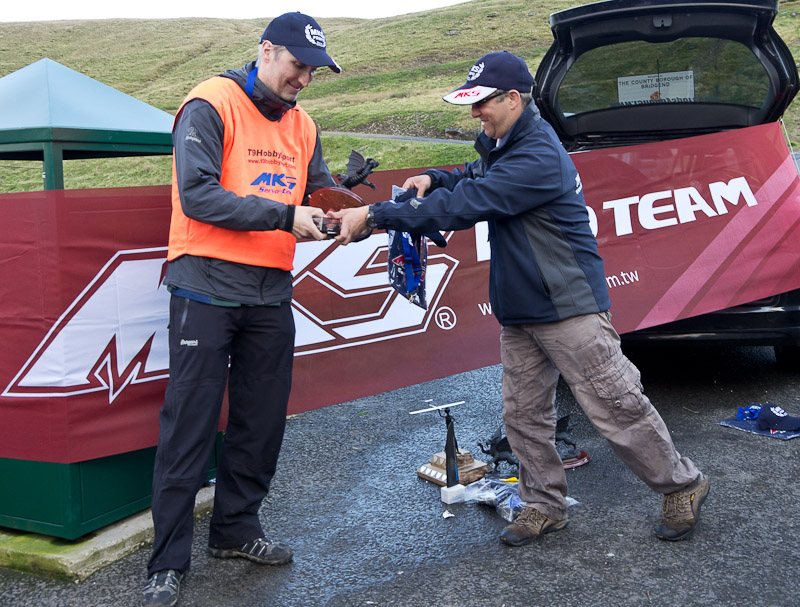 Dag Skoglund collects third place trophy from T9 boss Rich Bago